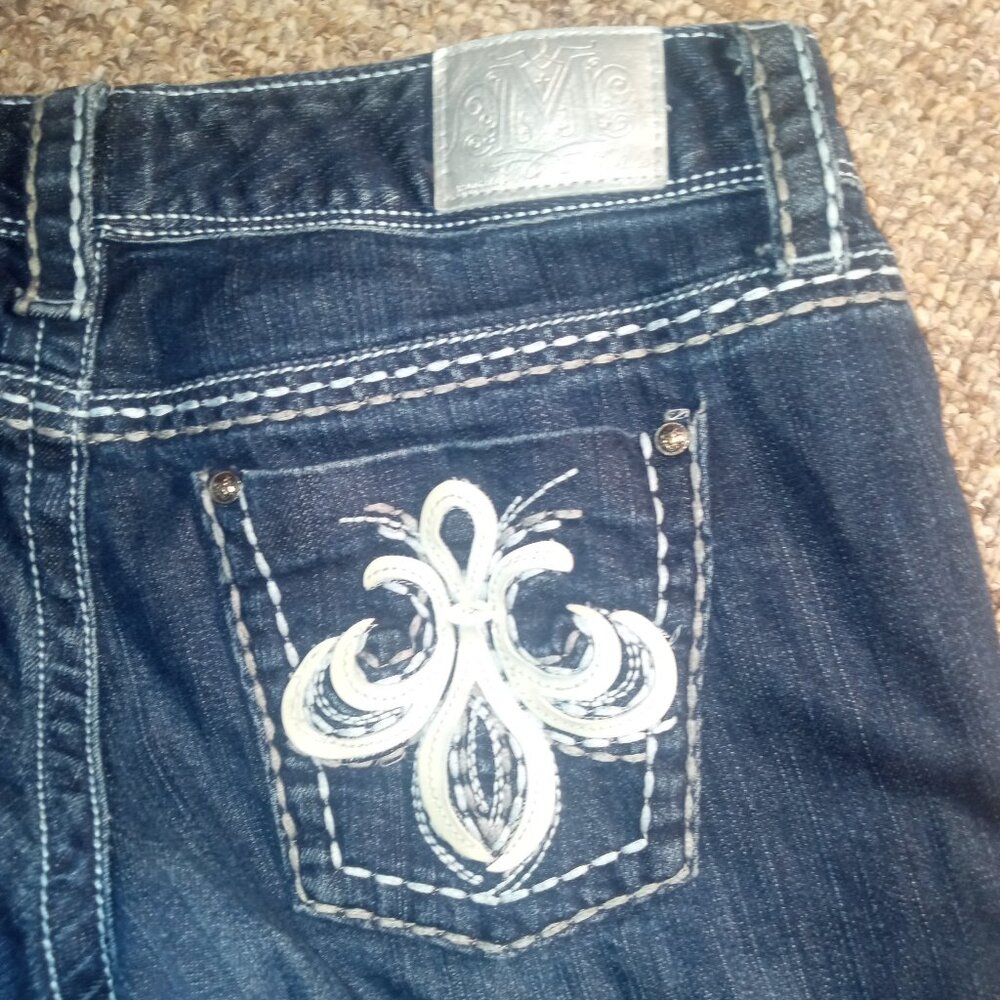 Maurices premium dark jeans size 9/10 short stretch jeans leather detailing